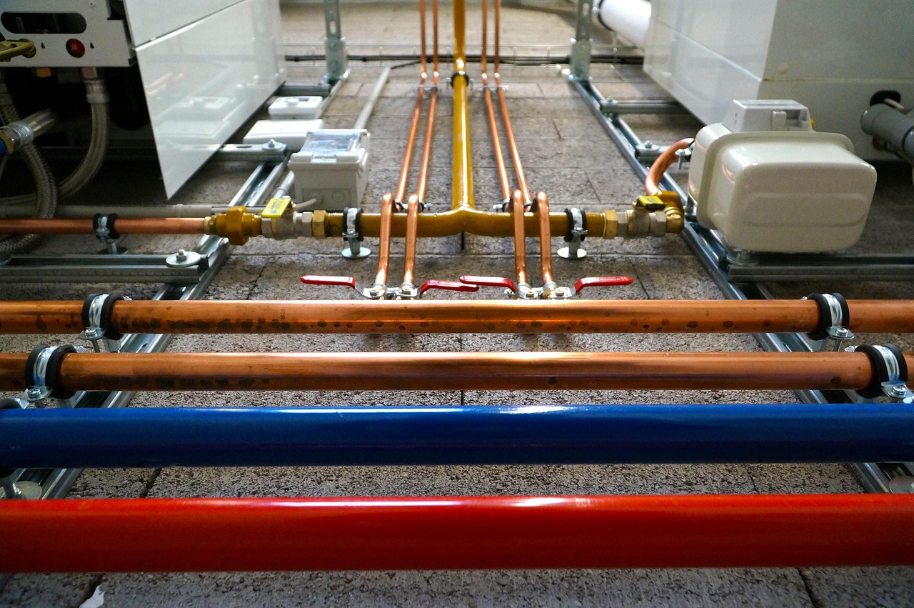Copper and gas supply lines in a utility room